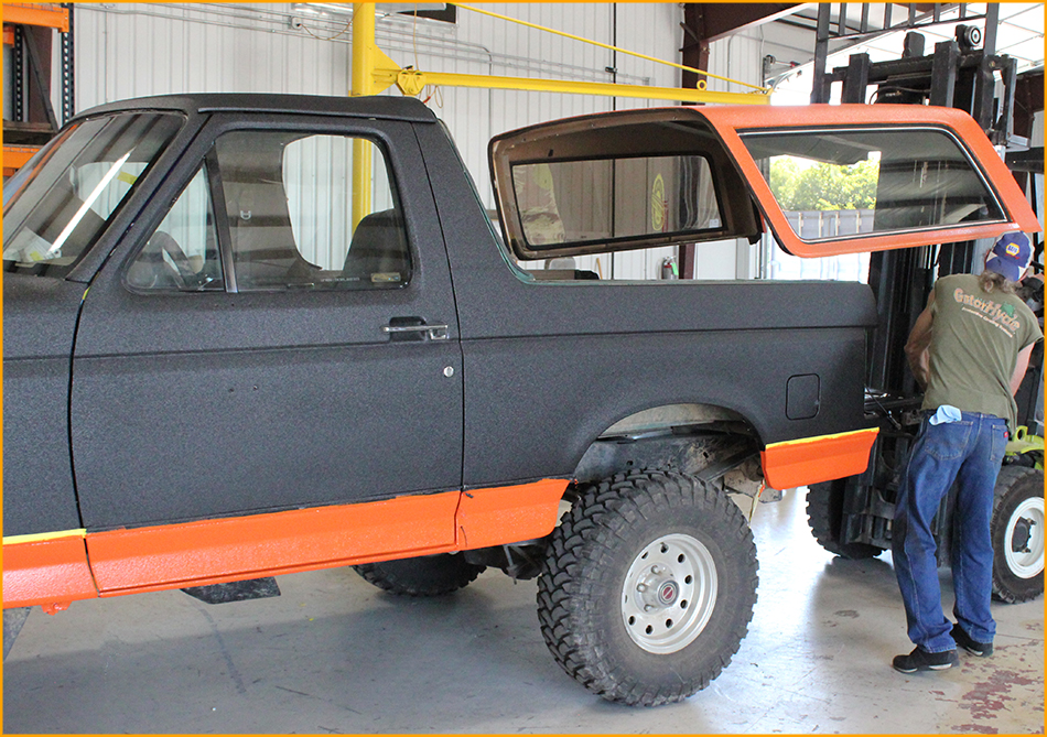 Installing 90's Ford Bronco top. 