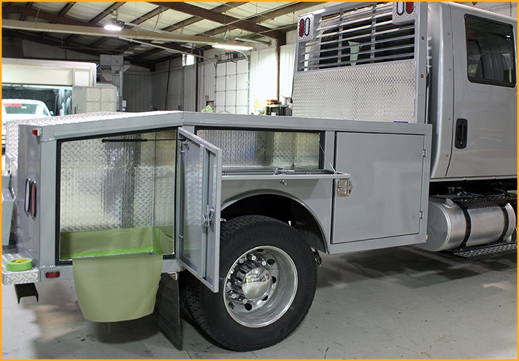 Interior of side compartments of truck masked off and ready for GatorHyde spray.