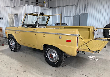 70's Bronco interior floor and bed sprayed with GatorHyde polyurea basecoat and topcoated with Golden Rod automotive urethane paint