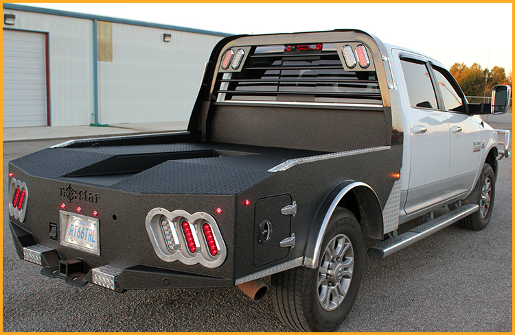 Bobtail goose-neck trailer hauler sprayed with GatorHyde on the bumper, sides and bed