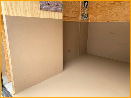  Rear interior section of trailer protected with polyurea spray (tailgate, floor and walls 3 1/2 ft. high).