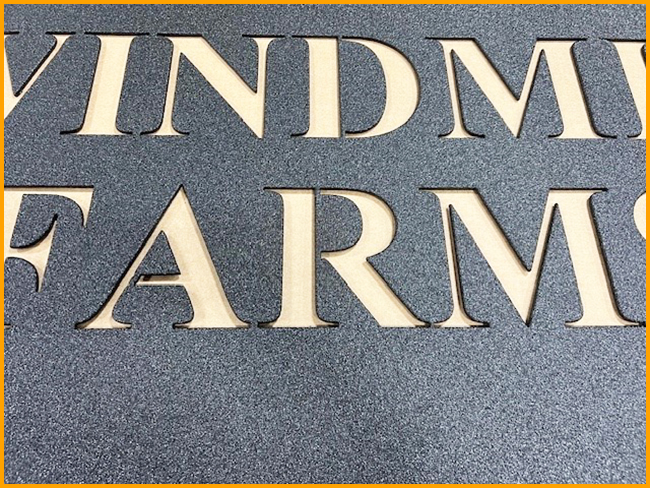 Metal sign, laser cut and coated with GatorHyde DLX.